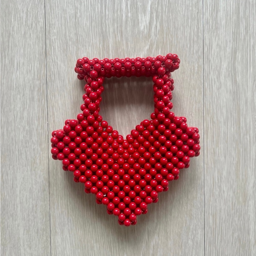 Red heart shaped beaded handbag